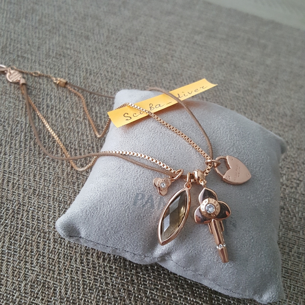 Brand New RARE Henri Bendel Rose Gold Necklace with Charms Pendants
